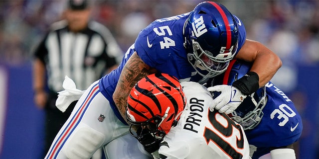 New York Giants' Blake Martinez tackles Cincinnati Bengals' Kendric Pryor (19) during the first half of a preseason NFL football game, Sunday, Aug. 21, 2022, in East Rutherford, N.J.