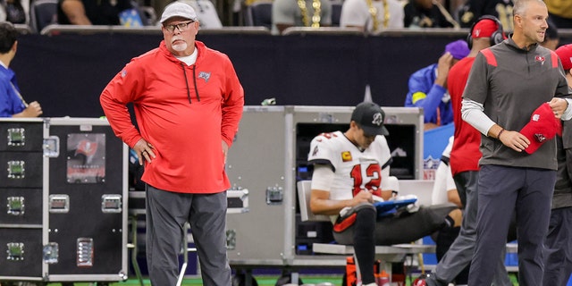 Tampa Bay Buccaneers Senior Football Consultant Bruce Arians reacts to a play as quarterback Tom Brady, #12, looks over the play from the bench against the New Orleans Saints during the first half at Caesars Superdome Sept. 18, 2022 in New Orleans.