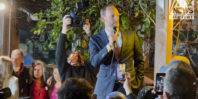 Then-San Francisco District Attorney Chesa Boudin speaks to a crowd of supporters at his recall election party in San Francisco. 