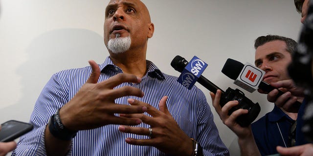 Tony Clark, executive director of the Major League Baseball Players Association, answers questions about the sign stealing scandal before a spring training workout Feb. 19, 2020, at Clover Park in Port St. Lucie, Fla.