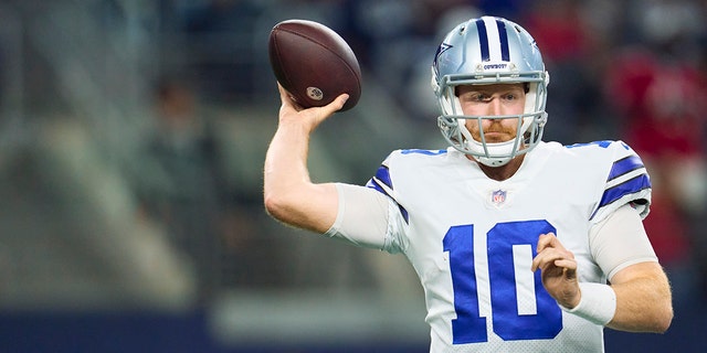 Cooper Rush, #10 of the Dallas Cowboys, drops back to pass against the Tampa Bay Buccaneers at AT&amp;T Stadium on Sept. 11, 2022 in Arlington, Texas. 