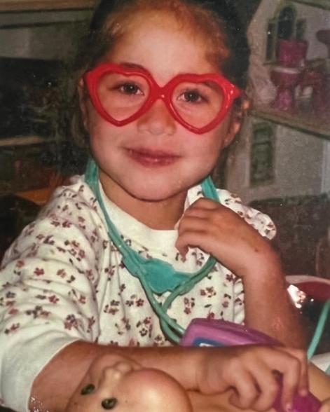 Paniagua playing doctor when she was 3 years old
