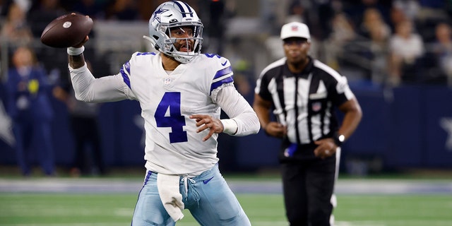 Dallas Cowboys quarterback Dak Prescott throws a pass against the Tampa Bay Buccaneers in Arlington, Texas, Sunday, Sept. 11, 2022.