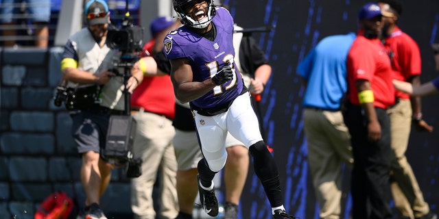 Baltimore Ravens wide receiver Devin Duvernay celebrates after his touchdown run against the Miami Dolphins, Sept. 18, 2022.