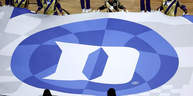 A detail image of the Duke Blue Devils flag during the national anthem before the game between the Kansas Jayhawks and the Villanova Wildcats during the 2022 NCAA Men's Basketball Tournament Final Four semifinal at Caesars Superdome on April 2, 2022 in New Orleans, Louisiana.