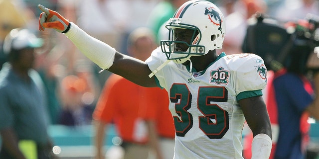 Cornerback Eddie Jackson of the Miami Dolphins celebrates after the Dolphins defeated the Carolina Panthers at Dolphins Stadium in Miami, Fla., on Sept. 25, 2005.