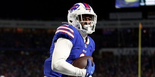 The Buffalo Bills' Emmanuel Sanders scores a touchdown against the New England Patriots during the third quarter of the AFC Wild Card playoff game at Highmark Stadium in Orchard Park, New York, on Jan. 15, 2022.