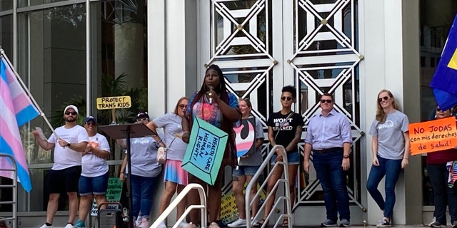 Shea Cutliff, of RISE Coalition, during a rally against a proposed ban against gender-affirming care for transgender children and teens on Sunday, July 31, 2022, at Orlando City Hall in Florida. 