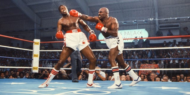 Larry Holmes, left, battles Earnie Shavers at Caesars Palace in Las Vegas on Sept. 28, 1979.