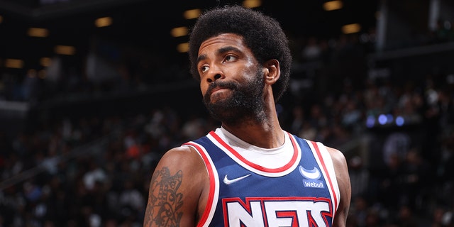 Kyrie Irving of the Brooklyn Nets looks on during Game 4 of the first round of the NBA playoffs on April 25, 2022, at Barclays Center in New York.