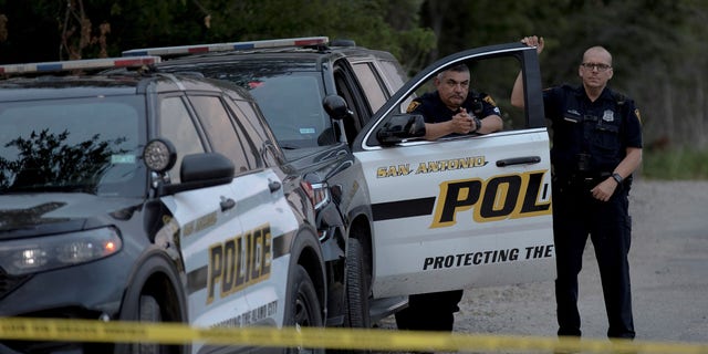 Police officers guard the scene of a human smuggling mass casualty event in San Antonio, Texas, on June 28, 2022. 