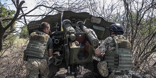 Ukrainian artillerymen in the military assembly center check the weapons and special equipment to make them ready before they go to their duties at the frontline in Kherson, Ukraine on July 15, 2022. 