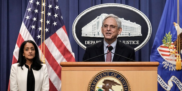 Associate Attorney General Vanita Gupta looks on as U.S. Attorney Merrick Garland speaks during a news conference on August 2, 2022, in Washington, DC. 