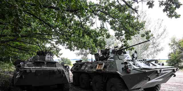 This photograph taken in Balakliya, Kharkiv region, on September 10, 2022 shows a Russian BTR-80 armoured vehicle. - Ukrainian forces said September 10, 2022 they had entered the town of Kupiansk in eastern Ukraine, dislodging Russian troops from a key logistics hub in a lightning counter-offensive that has seen swathes of territory recaptured. (Photo by Juan BARRETO / AFP) (Photo by JUAN BARRETO/AFP via Getty Images)