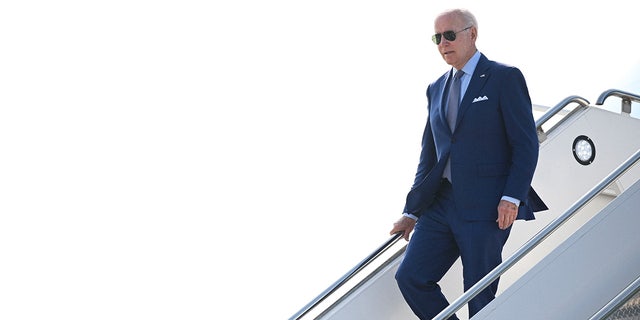 US President Joe Biden steps off Air Force One upon arrival at Detroit Metropolitan Wayne County Airport in Detroit, Michigan on September 14, 2022.