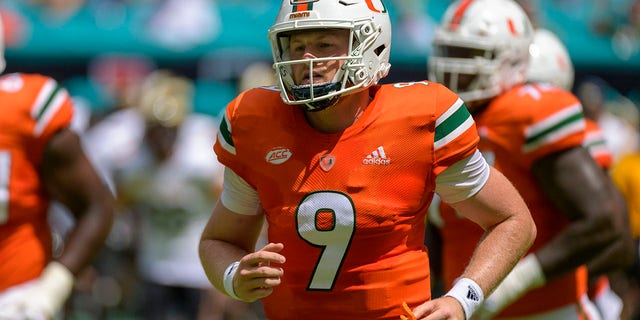 Miami quarterback Tyler Van Dyke (9) jogs on the field before the college football game between the Southern Miss Golden Eagles and the University of Miami Hurricanes on Sept. 10, 2022 at the Hard Rock Stadium in Miami Gardens, FL. 