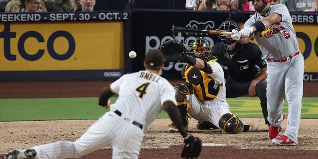 Albert Pujols of the St. Louis Cardinals hits a single off the Padres' Blake Snell during the seventh inning, Sept. 21, 2022, in San Diego.