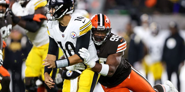 Browns defensive end Myles Garrett hits Pittsburgh Steelers quarterback Mitch Trubisky on Sept. 22, 2022, in Cleveland.