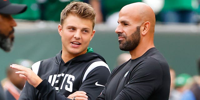 Jets quarterback Zach Wilson and head coach Robert Saleh talk before the Cincinnati Bengals game on Sept. 25, 2022.