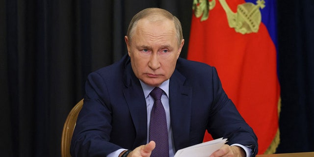 Russian President Vladimir Putin chairs a meeting in Sochi on Sept. 27, 2022.