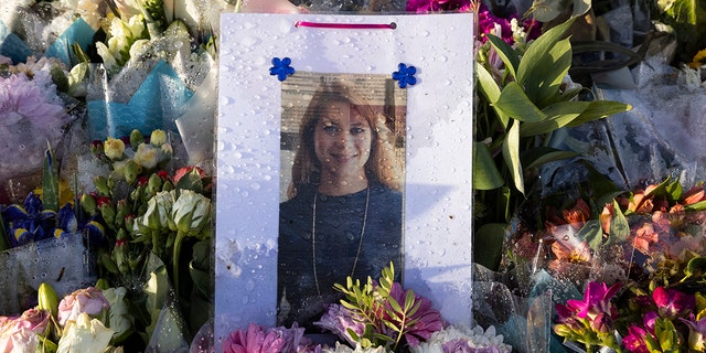 Flowers surround the Clapham Common bandstand memorial to murdered Sarah Everard on March 27, 2021, in London, England. Sarah Everard's kidnapping and death at the hands of an off-duty Metropolitan Police officer prompted a wave of concern over women's safety.  