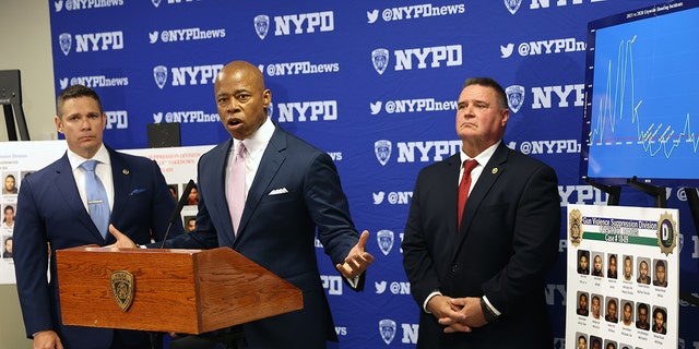 NEW YORK, NEW YORK - JUNE 06: New York Mayor Eric Adams is joined by NYPD Deputy Chief Jason Savino (left) and NYPD Chief of Detectives James Essig at a Brooklyn police facility where it was announced that arrests have been made against violent street gangs on June 06, 2022, in New York City. 