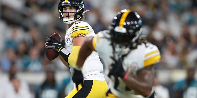 Kenny Pickett of the Pittsburgh Steelers drops back to pass during a preseason game against the Jaguars at TIAA Bank Field on Aug. 20, 2022, in Jacksonville, Florida.