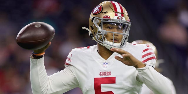 Trey Lance of the San Francisco 49ers looks to pass during the first quarter of a preseason game against the Houston Texans at NRG Stadium in Houston, Texas, on Aug. 25, 2022.