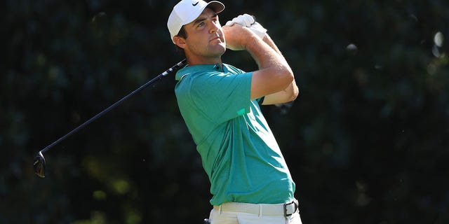 Scottie Scheffler of the U.S. plays his shot from the 17th tee during the final round of the Tour Championship at East Lake Golf Club Aug. 28, 2022, in Atlanta.