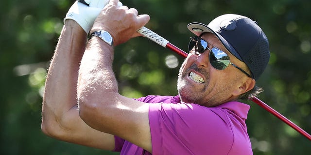 Team captain Phil Mickelson of Hy Flyers GC plays his shot from the fifth tee during the pro-am prior to the LIV Golf Invitational — Boston at The Oaks golf course at The International Sept. 1, 2022, in Bolton, Mass. 