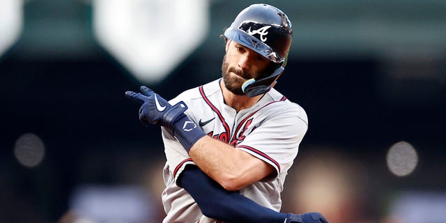 Dansby Swanson of the Atlanta Braves celebrates a two-run home run against the Seattle Mariners during the first inning at T-Mobile Park Sept. 9, 2022, in Seattle. 