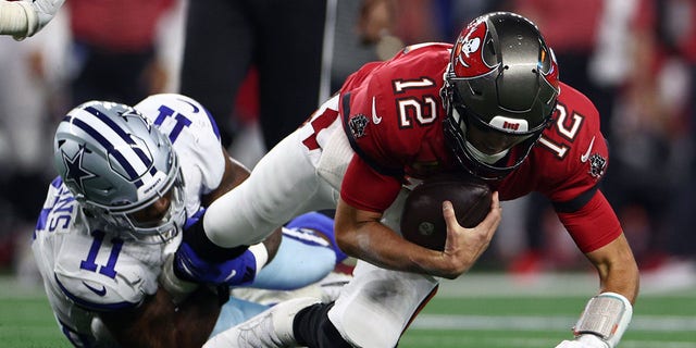 Micah Parsons of the Dallas Cowboys sacks Tom Brady of the Tampa Bay Buccaneers on Sept. 11, 2022, in Arlington, Texas.