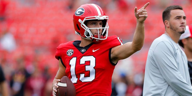 Stetson Bennett of the Georgia Bulldogs warms up before a game against the Samford Bulldogs at Sanford Stadium Sept. 10, 2022, in Atlanta.