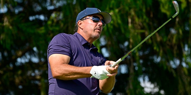 Team captain Phil Mickelson, of Hy Flyers GC, plays his shot on the third tee during Day One of the LIV Golf Invitational - Chicago at Rich Harvest Farms on Sept. 16, 2022 in Sugar Grove, Illinois. 