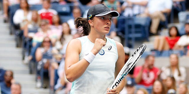 Iga Swiatek of Poland celebrates a point against Ons Jabeur of Tunisia during their Women’s Singles Final match on Day Thirteen of the 2022 US Open at USTA Billie Jean King National Tennis Center on September 10, 2022 in the Flushing neighborhood of the Queens borough of New York City.