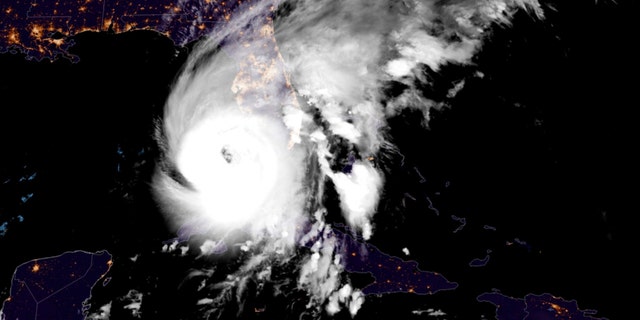 This GOES-East GeoCcolor satellite image taken at 12:41 a.m. EDT on Wednesday, Sept. 28, 2022, and provided by the National Oceanic and Atmospheric Administration (NOAA), shows Hurricane Ian over the Gulf of Mexico. Cuba remained in the dark early Wednesday after Hurricane Ian knocked out its power grid and devastated some of the country’s most important tobacco farms when it hit the island’s western tip as a major storm. 