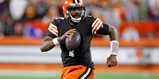 Cleveland Browns quarterback Jacoby Brissett scrambles for a short gain during the second half of an NFL football game against the Pittsburgh Steelers in Cleveland, Thursday, Sept. 22, 2022.