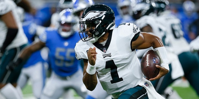 Philadelphia Eagles quarterback Jalen Hurts (1) runs the ball against the Detroit Lions in the first half of an NFL football game in Detroit, Sunday, Sept. 11, 2022.