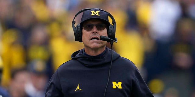 Michigan head coach Jim Harbaugh watches in the first half of a game against Maryland in Ann Arbor, Mich., Saturday, Sept. 24, 2022.