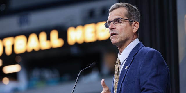 Head coach Jim Harbaugh of the Michigan Wolverines speaks during the 2022 Big Ten Conference Football Media Days at Lucas Oil Stadium in Indianapolis, Indiana, on July 26, 2022.