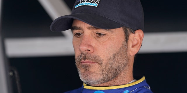 Jimmie Johnson sits in his pit box before the final practice for the Indianapolis 500 auto race at Indianapolis Motor Speedway, Friday, May 27, 2022, in Indianapolis.