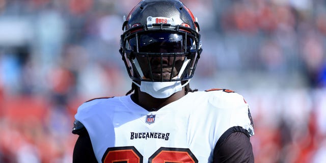 Jason Pierre-Paul of the Tampa Bay Buccaneers warms up before playing the Los Angeles Rams in the NFC Divisional Playoff game at Raymond James Stadium in Tampa, Fla., on Jan. 23, 2022.