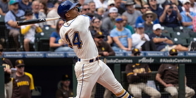 Seattle Mariners' Julio Rodriguez hits a single off San Diego Padres starting pitcher Mike Clevinger during the second inning of a baseball game, Wednesday, Sept. 14, 2022, in Seattle.