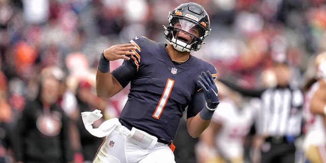 Chicago Bears quarterback Justin Fields celebrates after a play during a game against the San Francisco 49ers Oct. 31, 2021, at Soldier Field in Chicago.