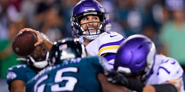 Minnesota Vikings quarterback Kirk Cousins throws a pass during the second half of an NFL football game against the Philadelphia Eagles, Monday, Sept. 19, 2022, in Philadelphia.