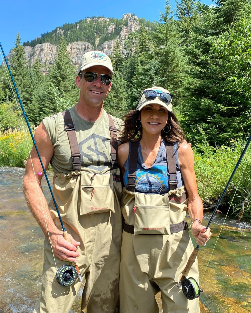 Noem, with First Husband Bryon, on a fishing trip.