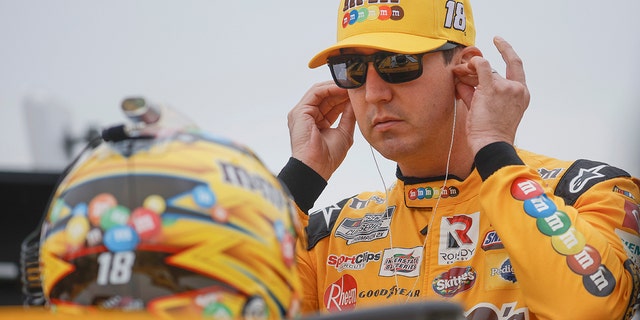 Kyle Busch, driver of the #18 M&amp;M's Toyota, prepares to practice for the NASCAR Cup Series Hollywood Casino 400 at Kansas Speedway on Sept. 10, 2022, in Kansas City, Kansas. 