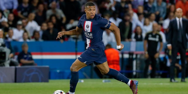 Kylian Mbappé of Paris Saint-Germain controls the ball during a UEFA Champions League group H match between Paris Saint-Germain and Juventus at Parc des Princes Sept. 6, 2022, in Paris.