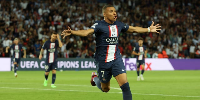 Kylian Mbappé (7) of Paris Saint-Germain celebrates his second goal during a UEFA Champions League group H match between Paris Saint-Germain and Juventus at Parc des Princes Sept. 6, 2022 in Paris.