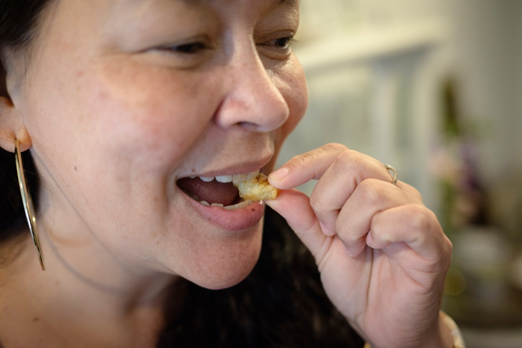 Pema Shakabpa, 49, a customer trying the mini croissant cereal.